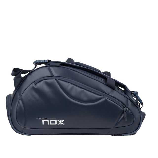 A navy Nox Pro Series Padel bag with multiple compartments and the brand logo visible on the side.