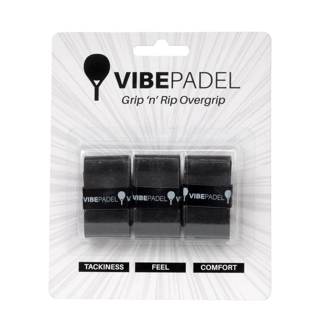 Three black Vibe padel racket overgrips, packaged in a clear plastic blister pack labeled with 'VIBEPADEL' and attributes like 'TACKINESS', 'FEEL', and 'COMFORT'.