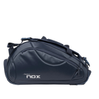 A navy Nox Pro Series Padel bag with multiple compartments and the brand logo visible on the side.